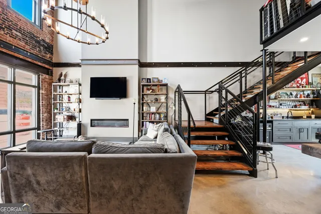 a view of livingroom with furniture and toys