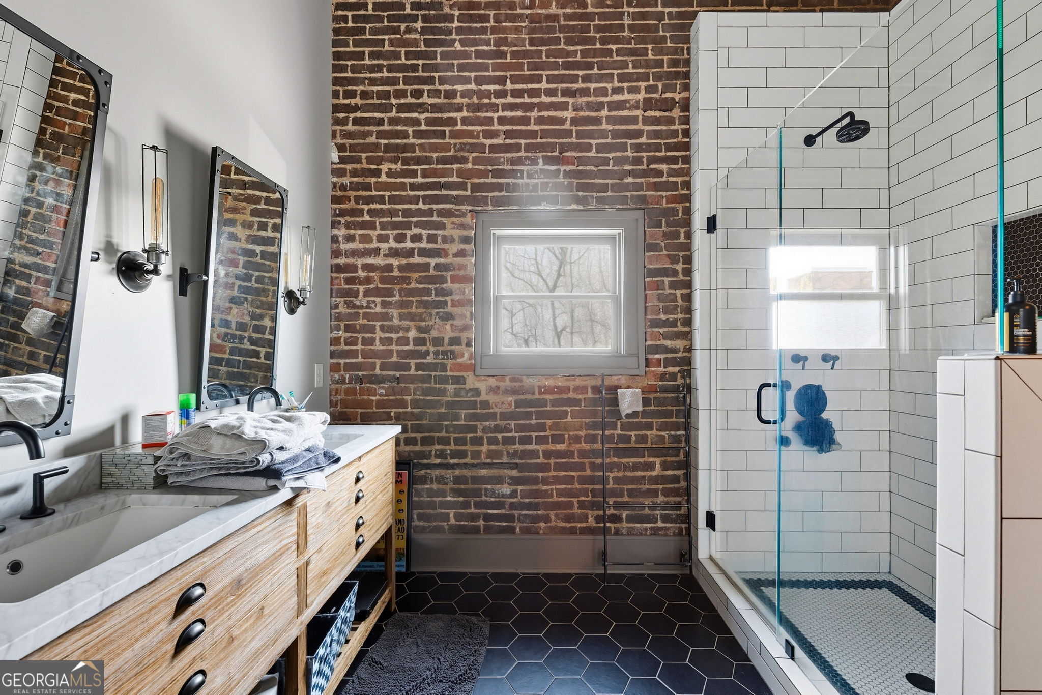534 2nd Street Macon, GA 31201 - Photo 19 of 25 a bathroom with a sink a toilet and shower