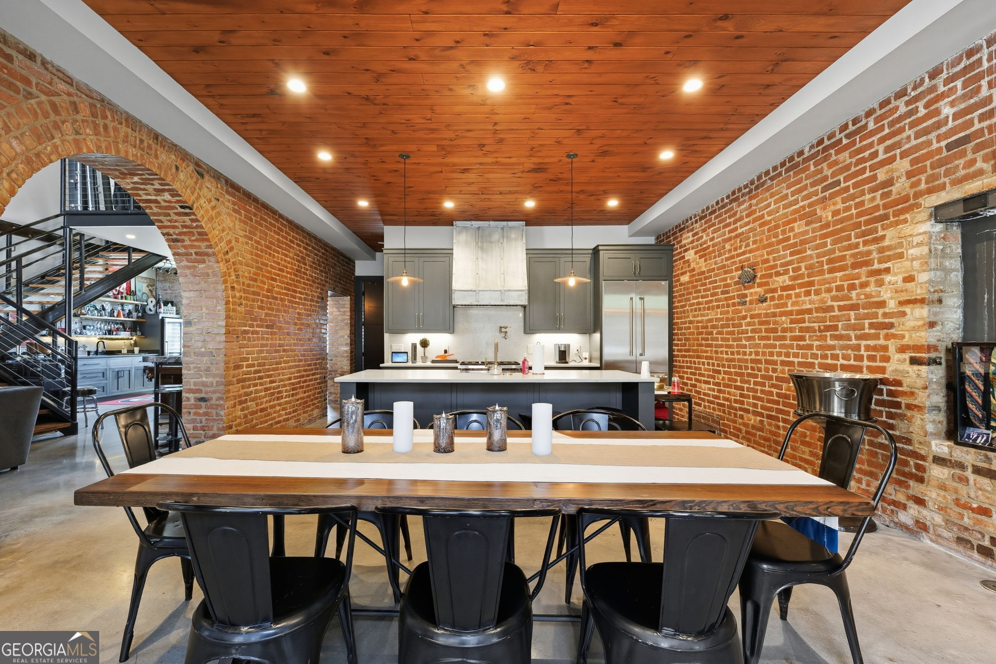 534 2nd Street Macon, GA 31201 - Photo 4 of 25 a dining room with furniture and a potted plant