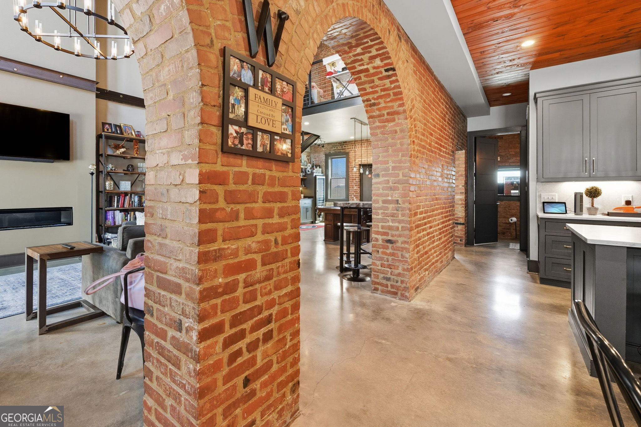 534 2nd Street Macon, GA 31201 - Photo 5 of 25 a view of a lobby with a flat screen tv and outdoor seating