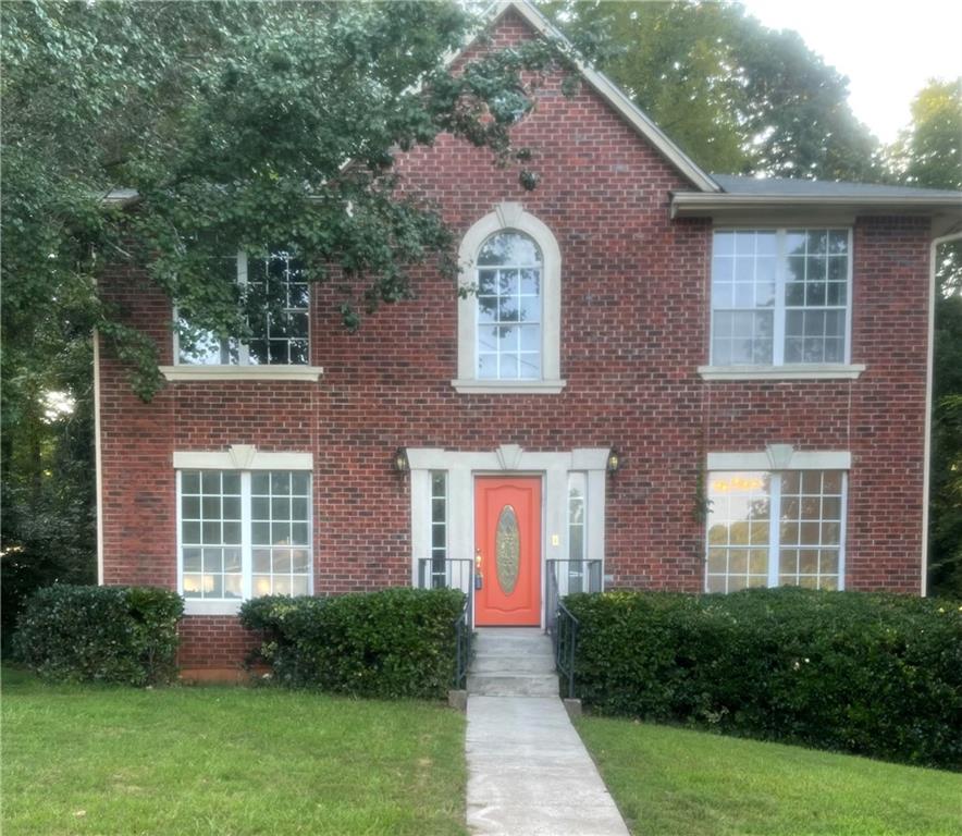 4463 Horseshoe Court Decatur, GA 30034 - Photo 1 of 1 a front view of a house with garden