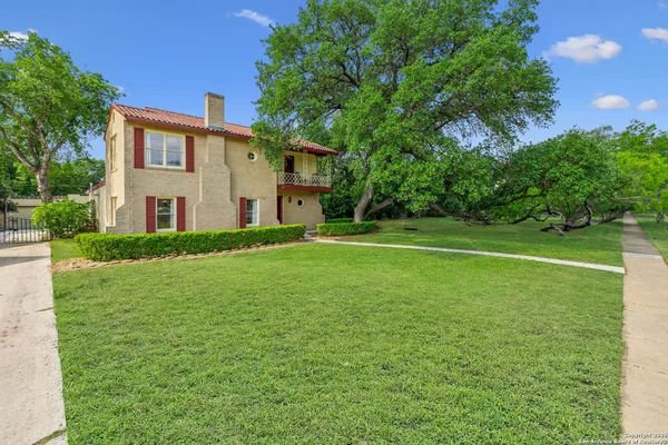 a view of a house with a big yard