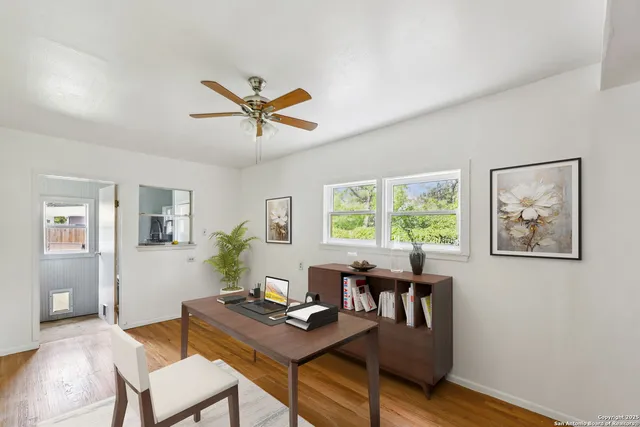 a workspace with furniture and window