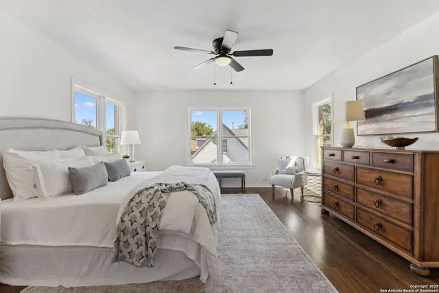 a bed room with bed and a window