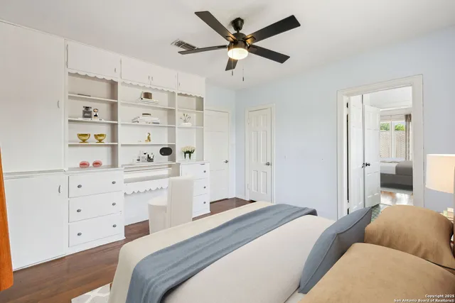 a bedroom with a bed and furniture