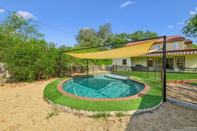 a view of outdoor space yard swimming pool and outdoor seating