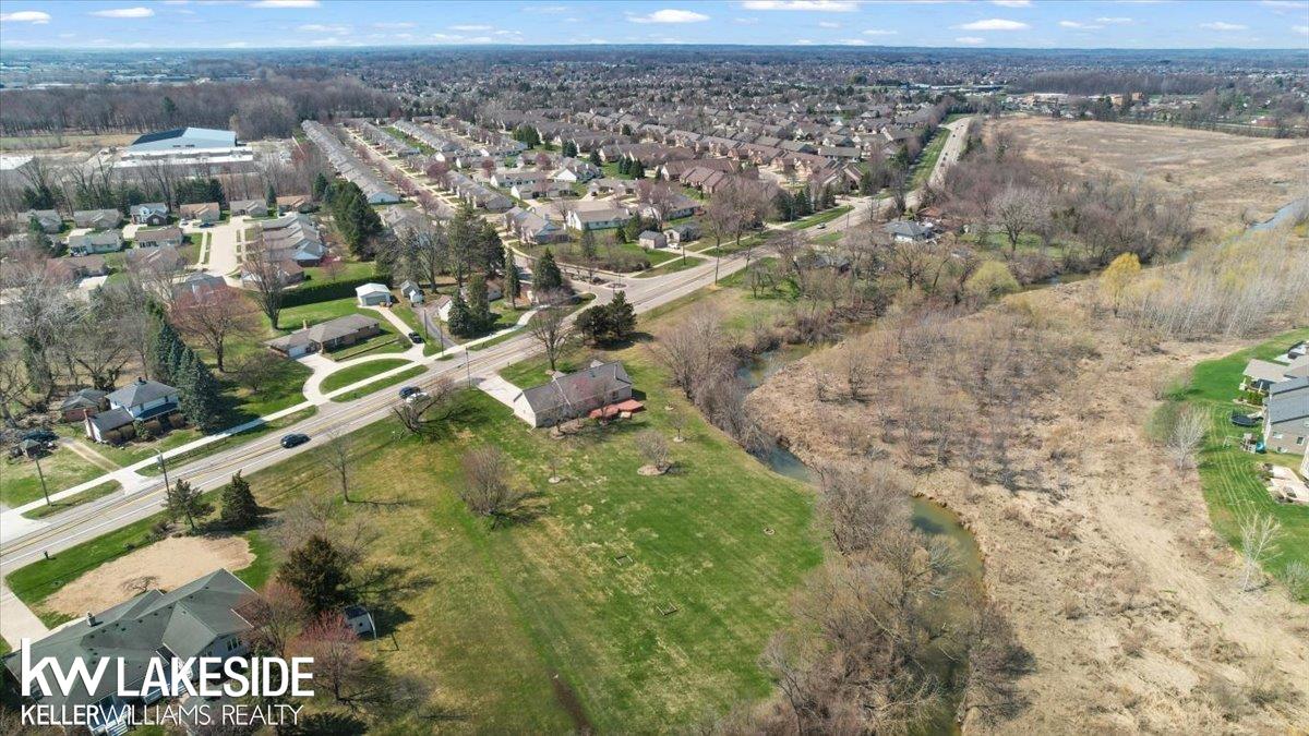 51980 Romeo Plank Road Macomb, MI 48042 - Photo 35 of 39 50203874-5c2941fe-770d-4116-8e6f-05d6ad646bd3.JPG