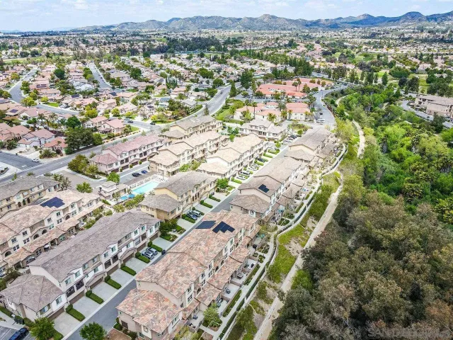a view of a city with tall buildings
