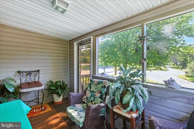 a outdoor living space with furniture and garden view