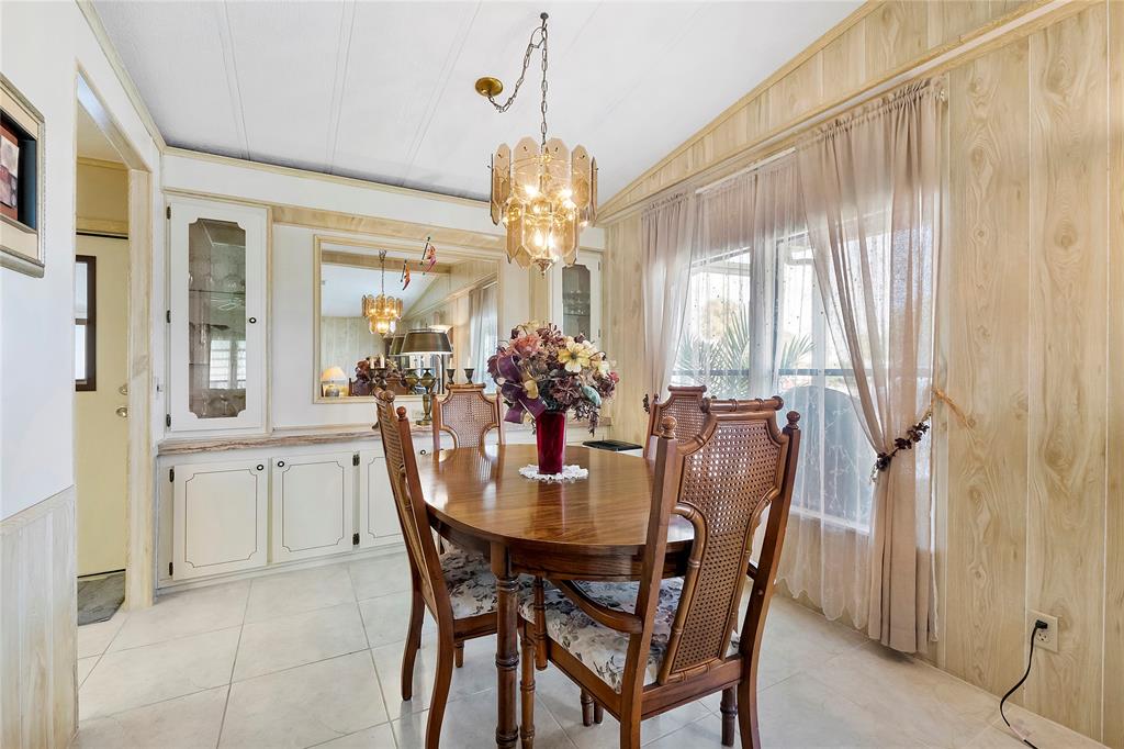 8600 Southwest 16th Place Davie, FL 33324 - Photo 6 of 20 a dining room with furniture and window