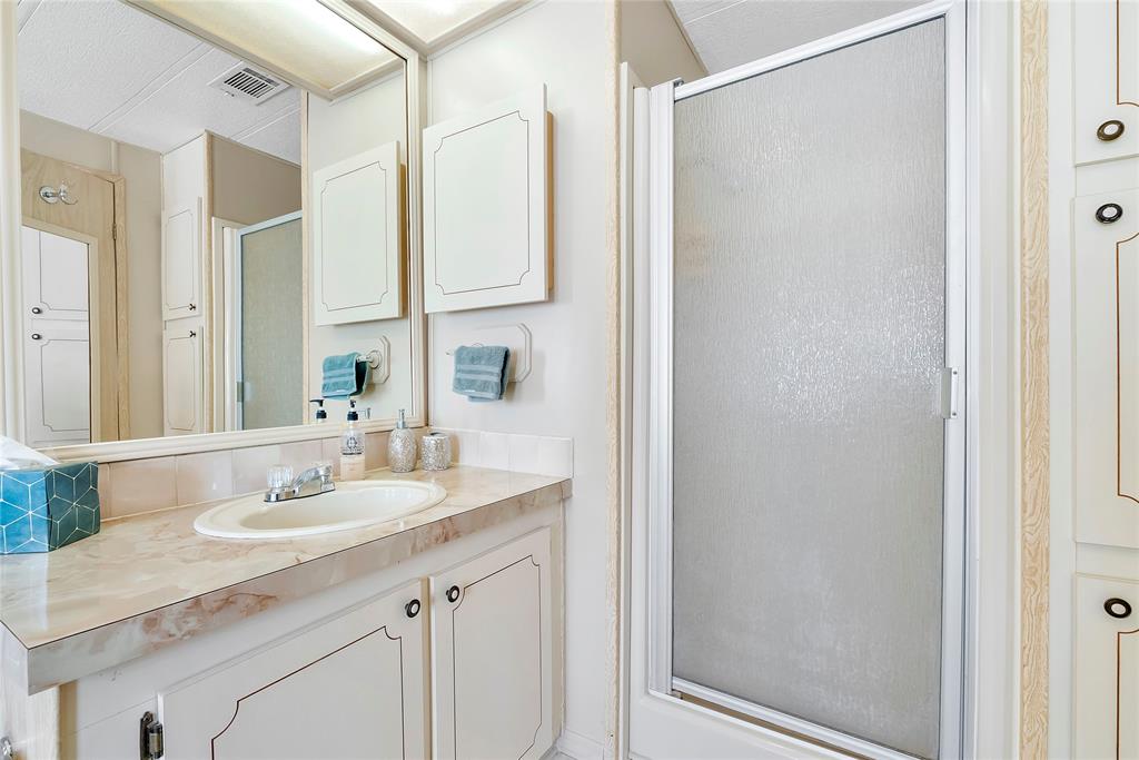 8600 Southwest 16th Place Davie, FL 33324 - Photo 10 of 20 a bathroom with a sink and a mirror