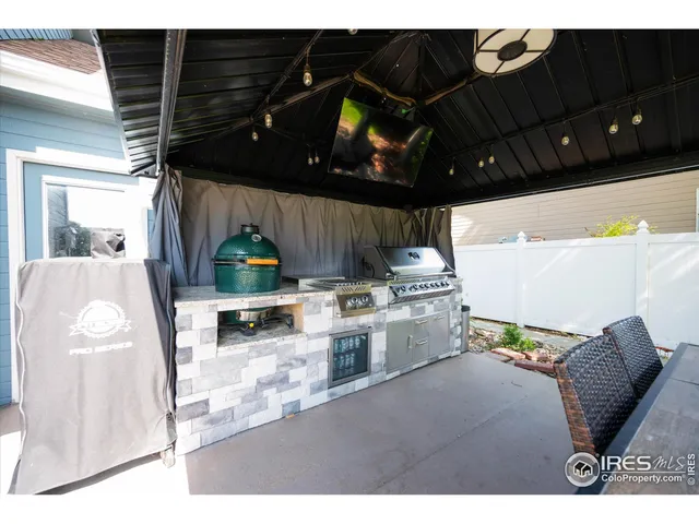 a view of kitchen with furniture and window