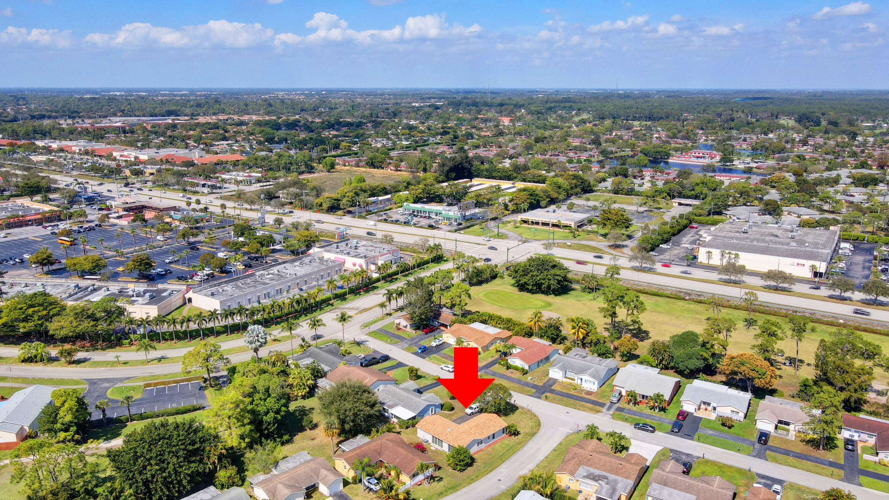 7258 Pine Manor Drive Lake Worth, FL 33467 - Photo 36 of 39 an aerial view of residential houses with outdoor space and trees
