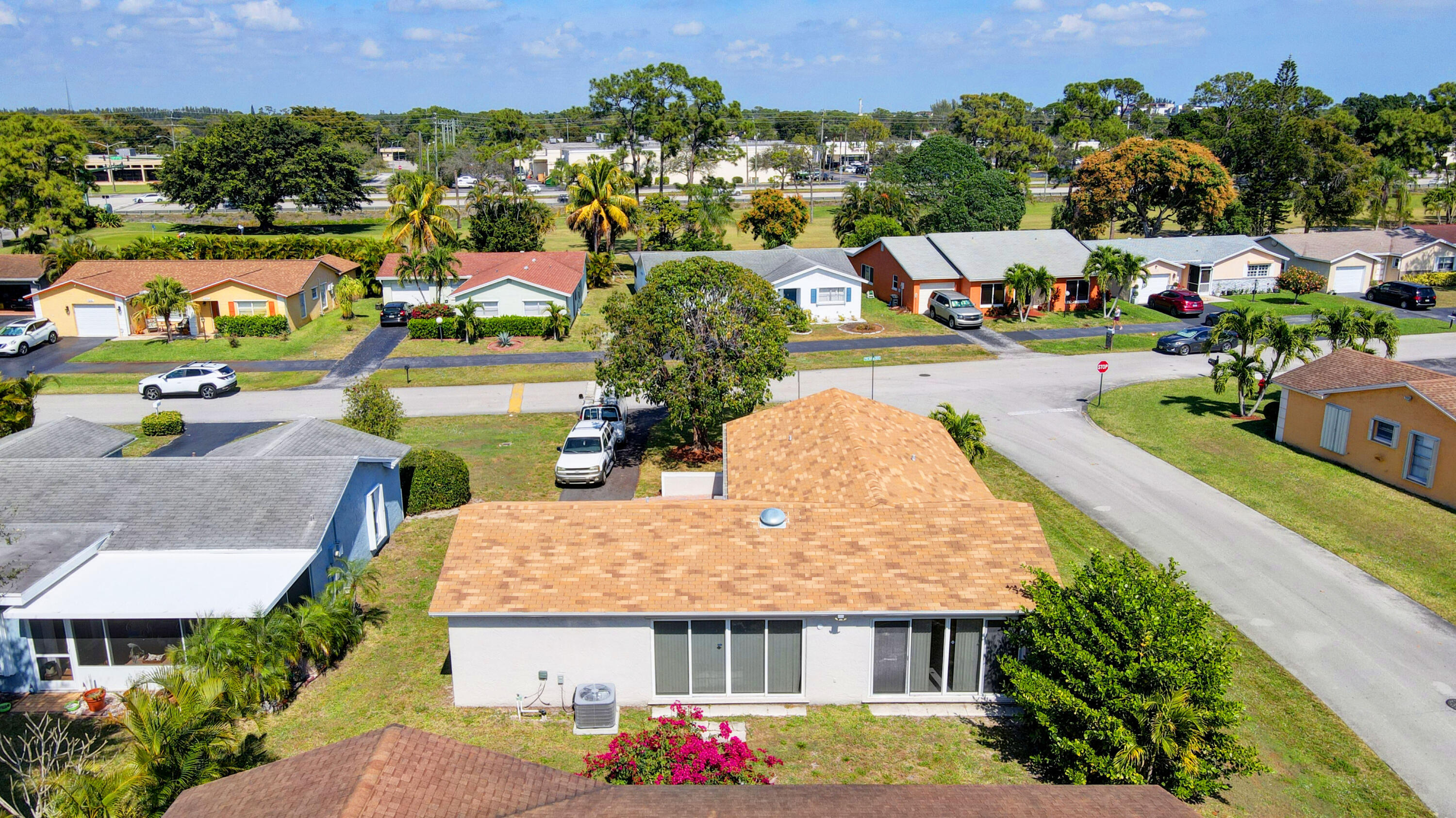 7258 Pine Manor Drive Lake Worth, FL 33467 - Photo 39 of 39 an aerial view of a house with swimming pool yard and outdoor seating