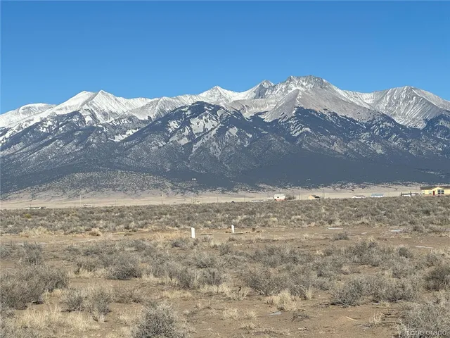 a view of mountain view with mountains in the background