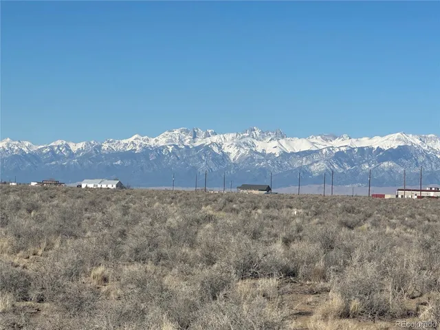 a view of mountain and tree