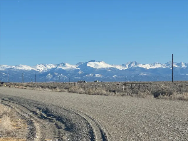 a view of mountain with sunset view