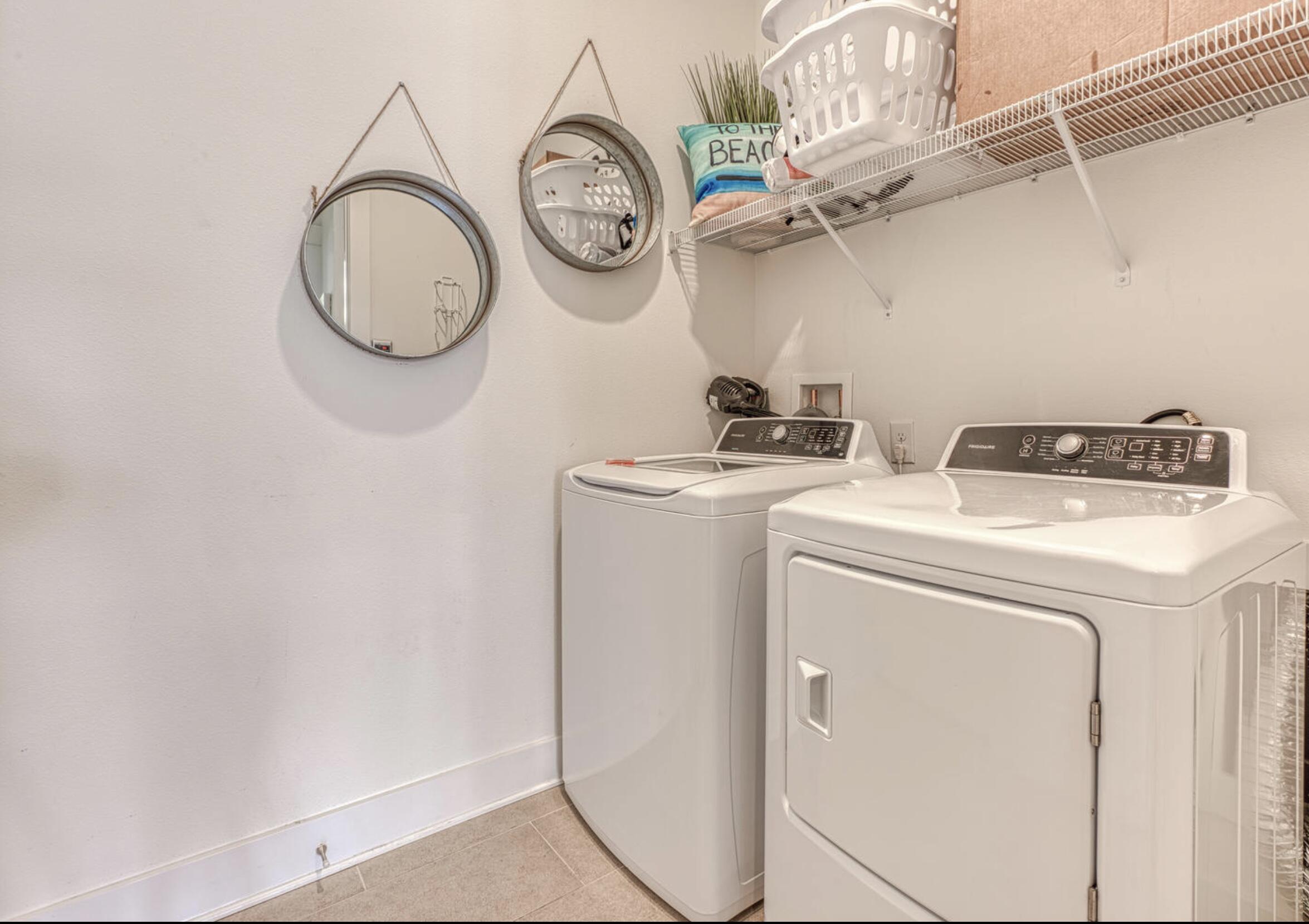 209 Milestone Dr Inlet Beach, Unit B Inlet Beach, FL 32461 - Photo 11 of 39 a utility room with dryer and washer