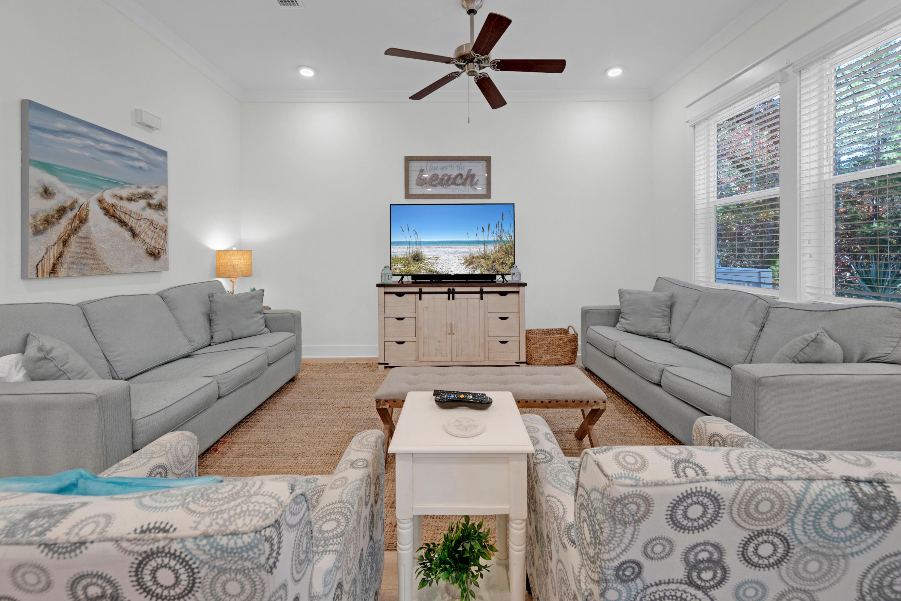 209 Milestone Dr Inlet Beach, Unit B Inlet Beach, FL 32461 - Photo 17 of 39 a living room with furniture and a window