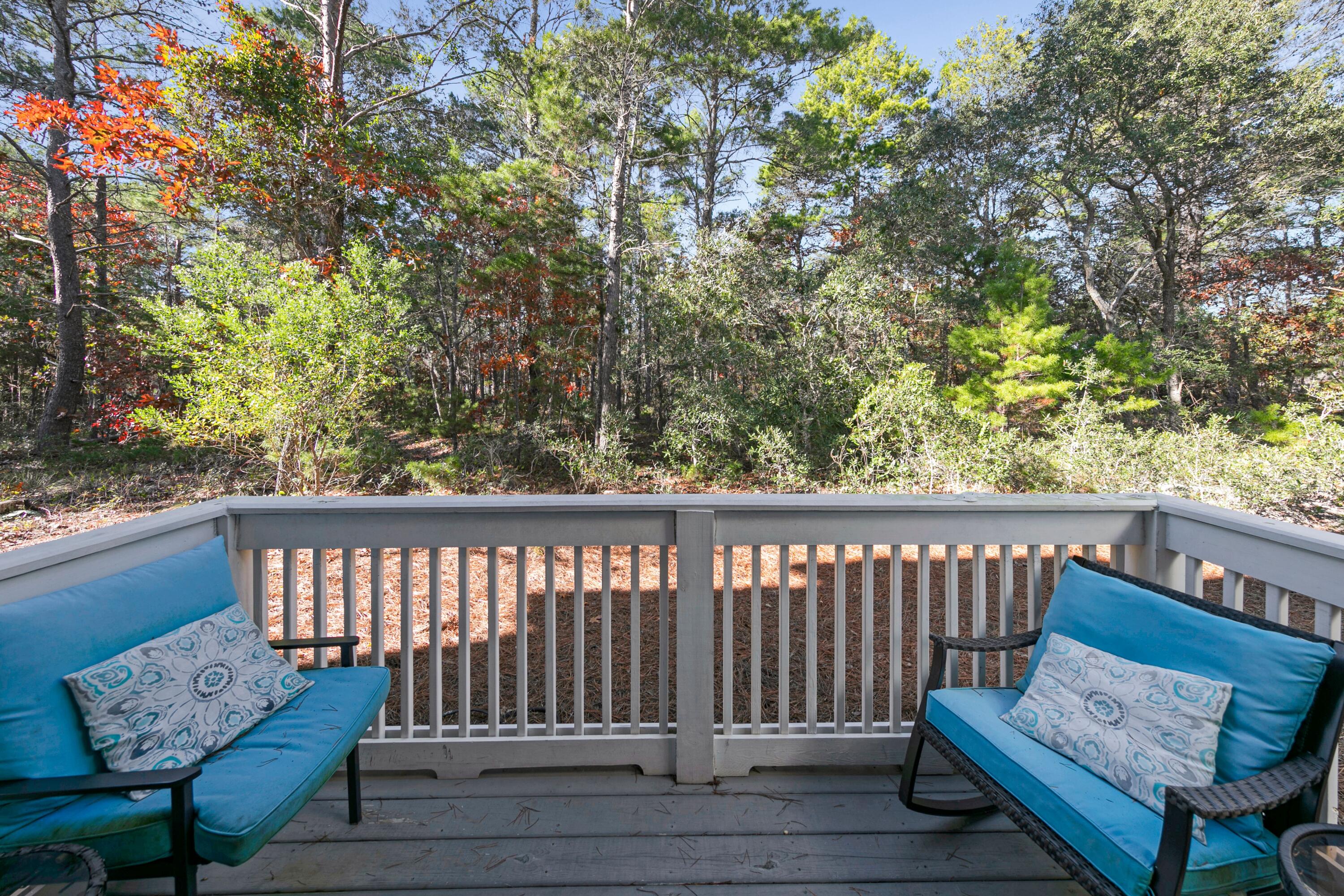 209 Milestone Dr Inlet Beach, Unit B Inlet Beach, FL 32461 - Photo 25 of 39 a view of a two chair on the deck