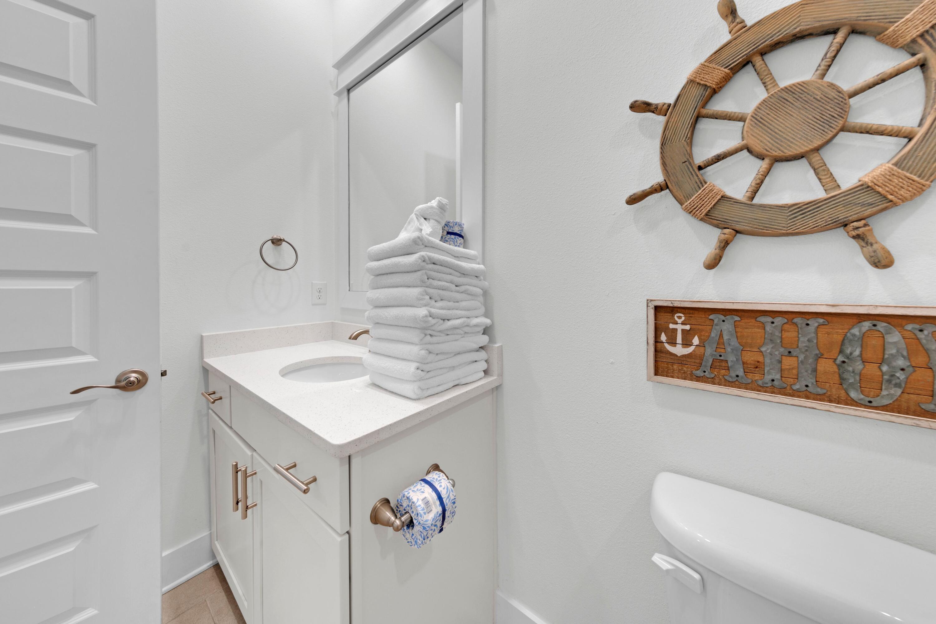 209 Milestone Dr Inlet Beach, Unit B Inlet Beach, FL 32461 - Photo 31 of 39 a bathroom with a sink and a mirror