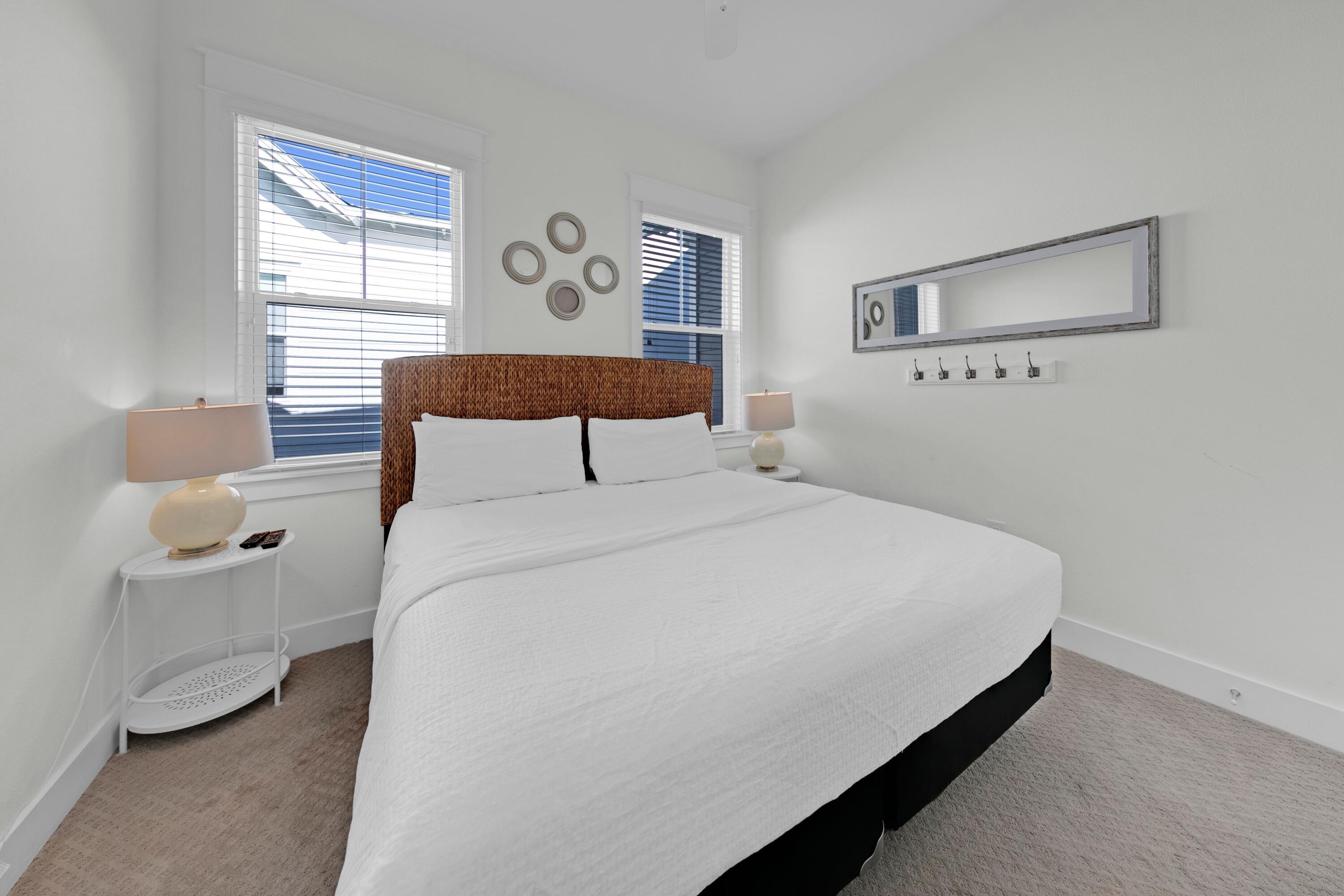 209 Milestone Dr Inlet Beach, Unit B Inlet Beach, FL 32461 - Photo 33 of 39 a bedroom with a bed and window