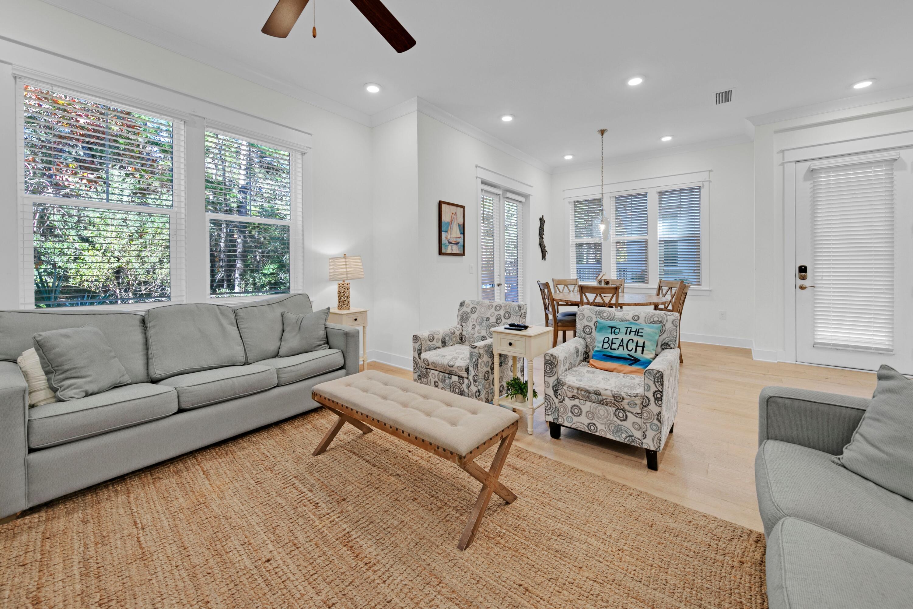 209 Milestone Dr Inlet Beach, Unit B Inlet Beach, FL 32461 - Photo 4 of 39 a living room with furniture and a large window