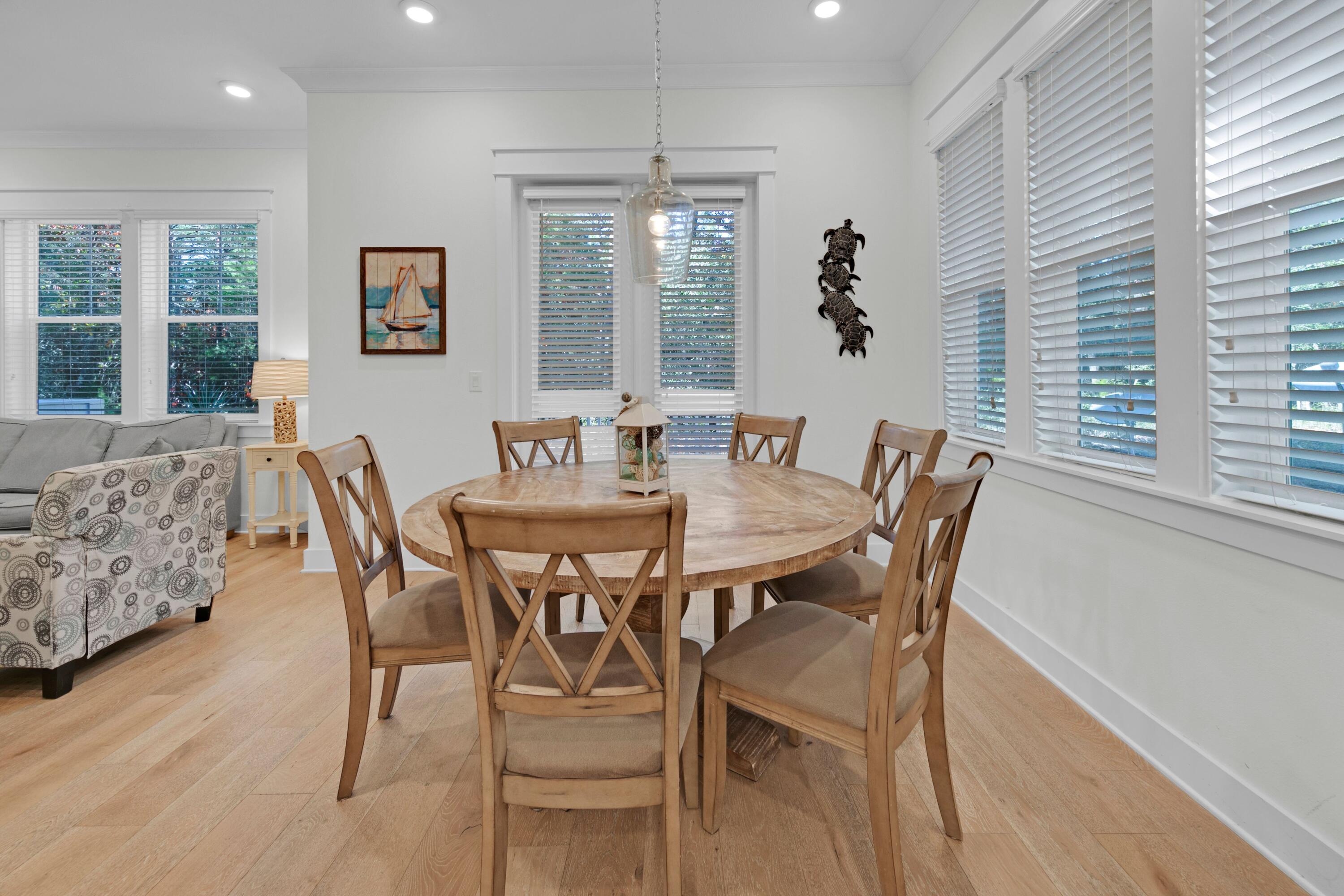 209 Milestone Dr Inlet Beach, Unit B Inlet Beach, FL 32461 - Photo 8 of 39 a view of a dining room with furniture window and outside view