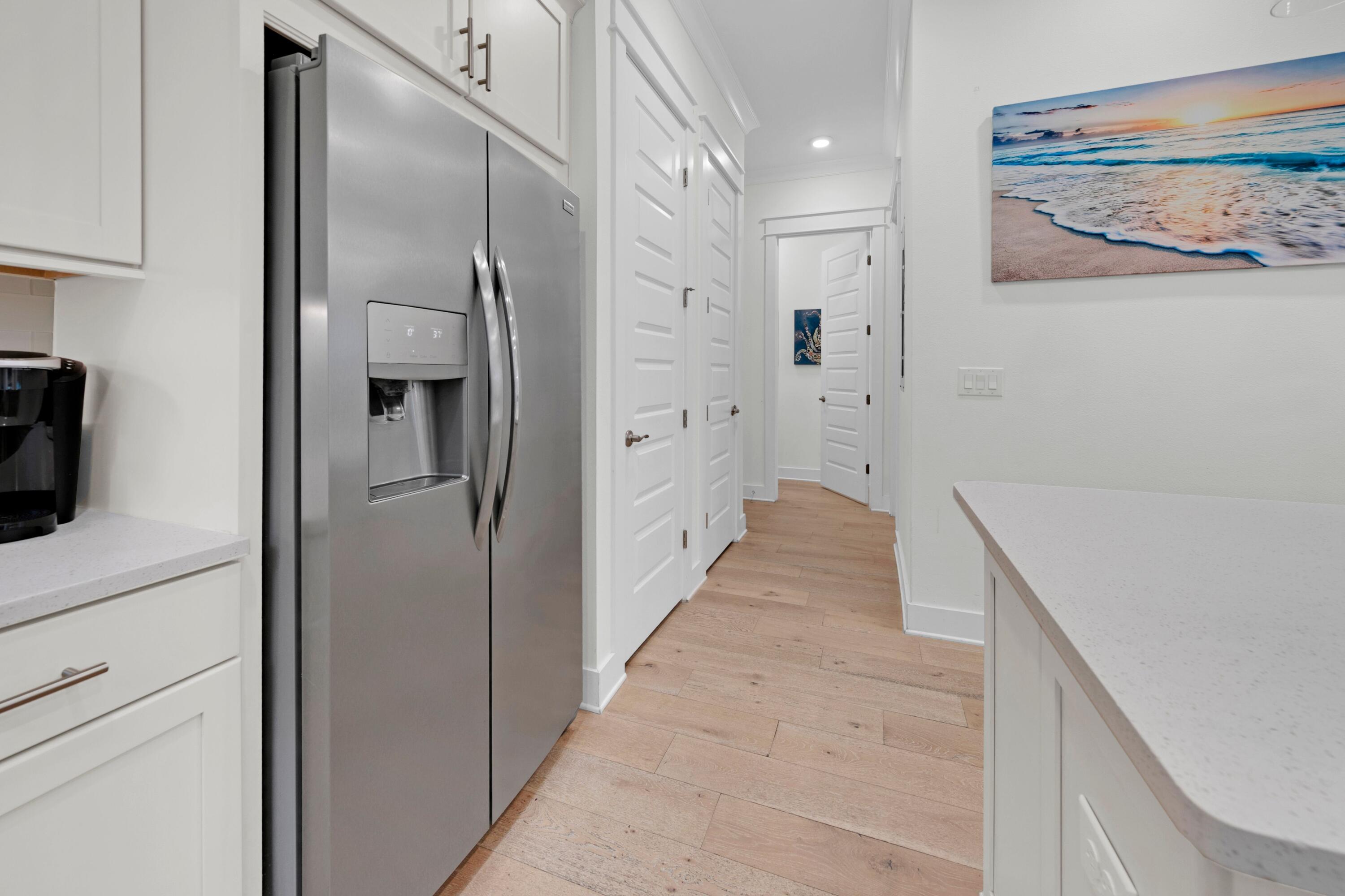 209 Milestone Dr Inlet Beach, Unit B Inlet Beach, FL 32461 - Photo 10 of 39 a bathroom with a double vanity sink and mirror