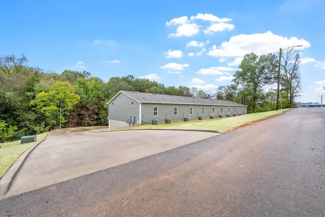 a view of swimming pool with an outdoor space and seating area