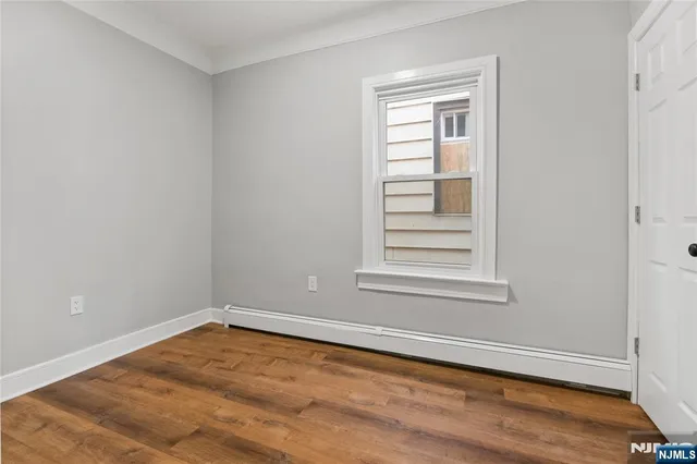 a view of a room that has a window in it