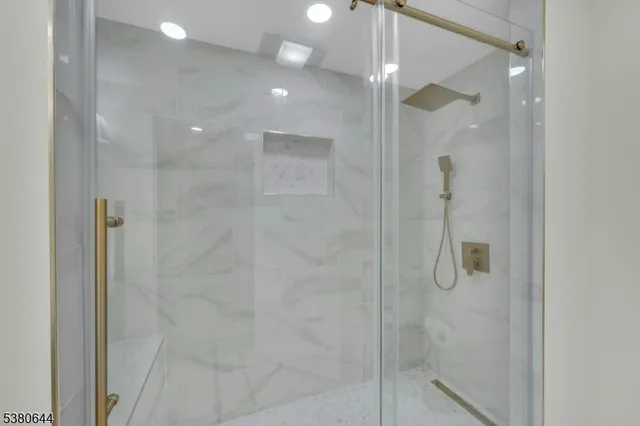 a view of a water pond with green yard