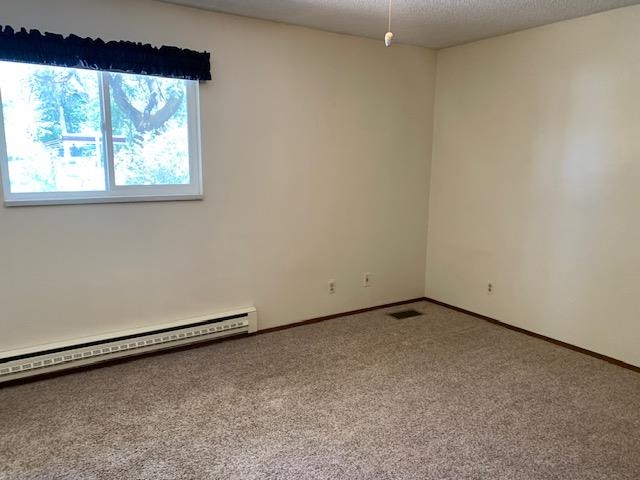 570 Southwest 2nd Court Cedaredge, CO 81413 - Photo 12 of 32 an empty room with a window