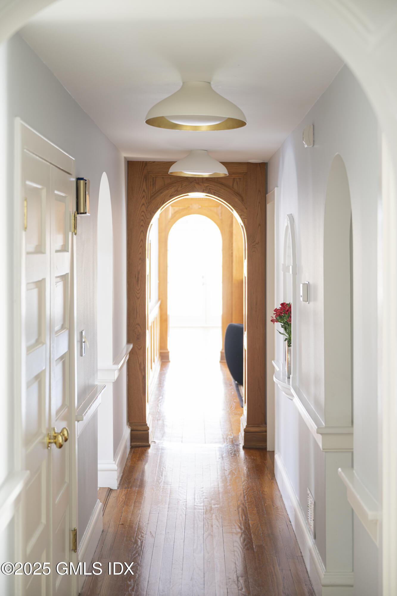 44 North Porchuck Road Greenwich, CT 06831 - Photo 14 of 61 a view of a hallway with wooden floor and entryway