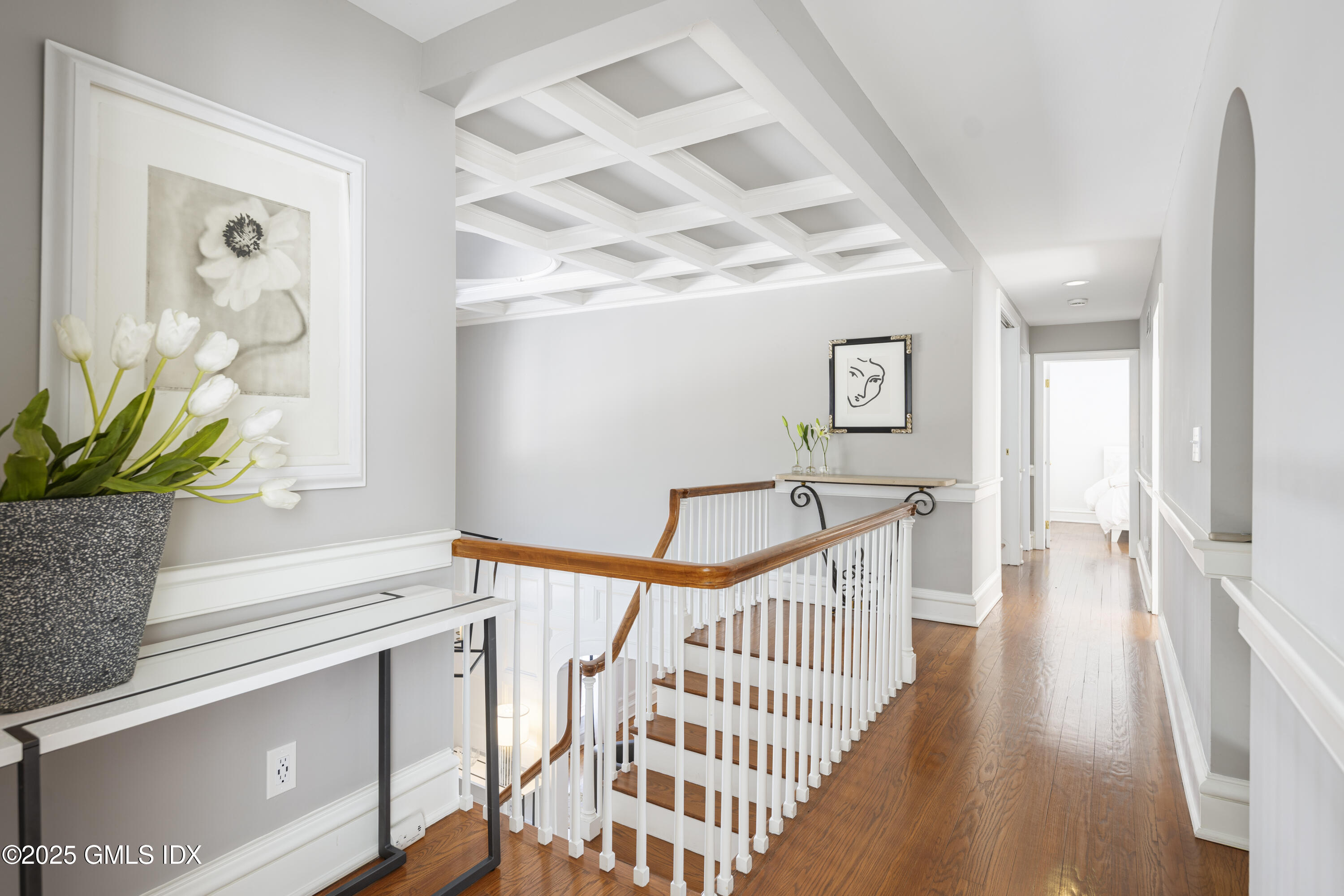 44 North Porchuck Road Greenwich, CT 06831 - Photo 19 of 61 a view of staircase with railing and a potted plant