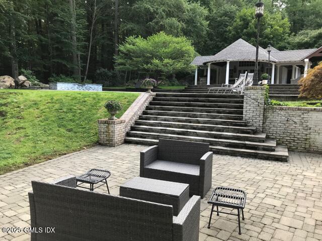 44 North Porchuck Road Greenwich, CT 06831 - Photo 46 of 61 a view of a house with a yard