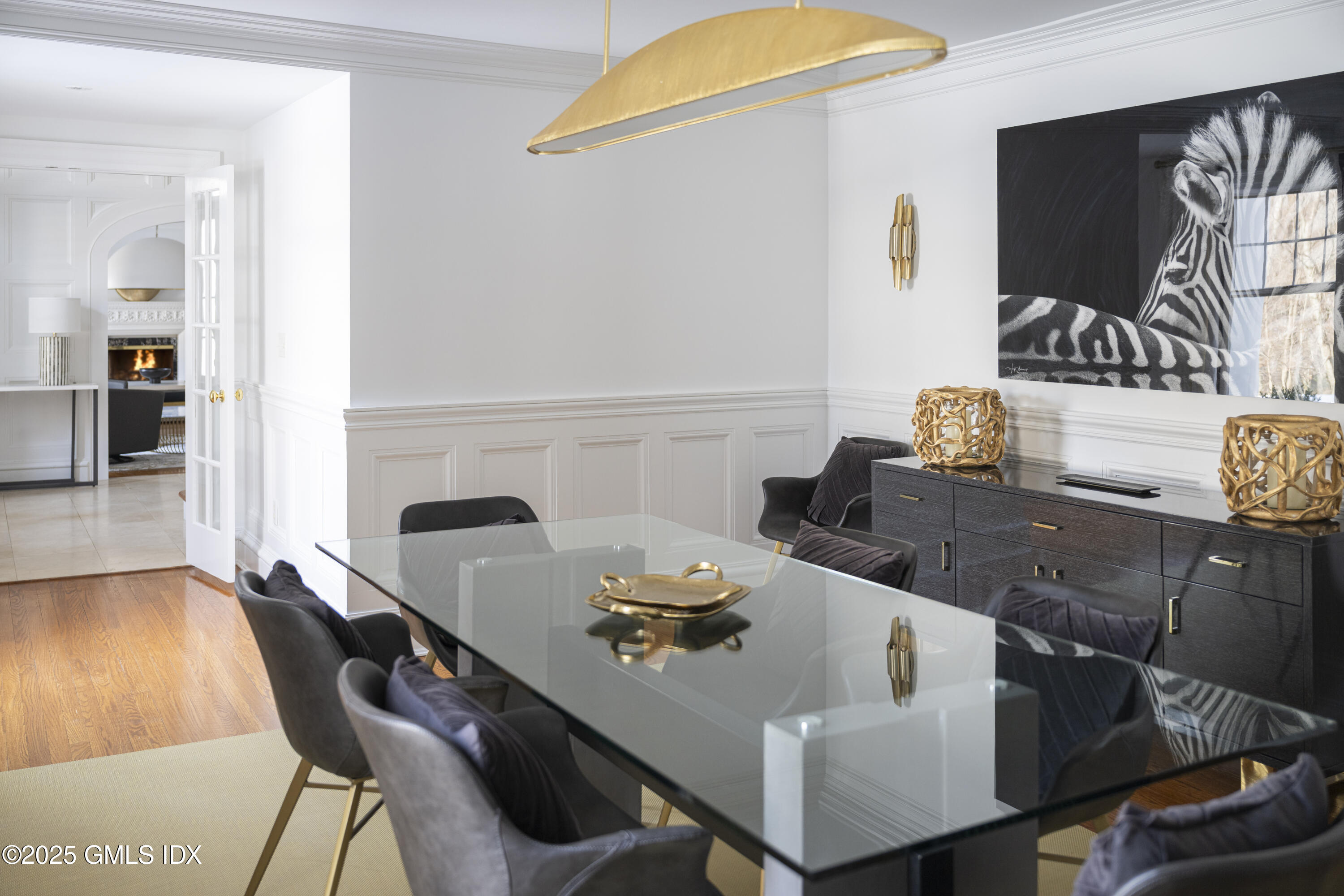 44 North Porchuck Road Greenwich, CT 06831 - Photo 6 of 61 a view of a dining room with furniture and wooden floor