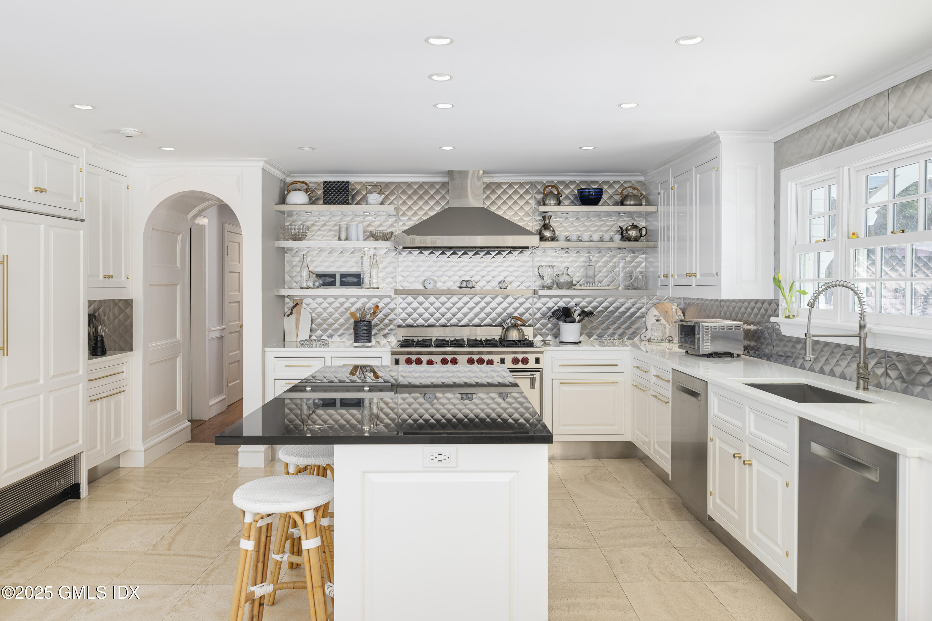 44 North Porchuck Road Greenwich, CT 06831 - Photo 7 of 61 a kitchen with stainless steel appliances granite countertop a stove and a sink