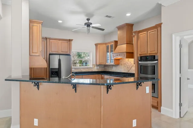 a view of an empty room with stairs