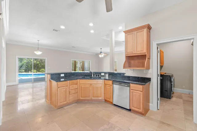 a bedroom with a large bed and a couch