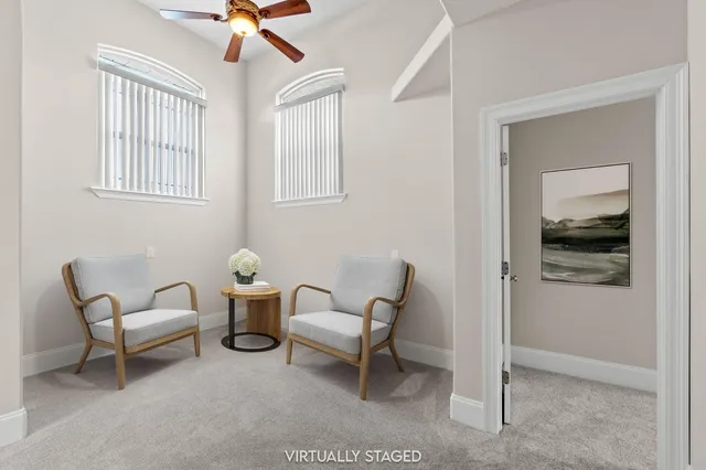 a bathroom with a granite countertop sink a toilet and bathtub