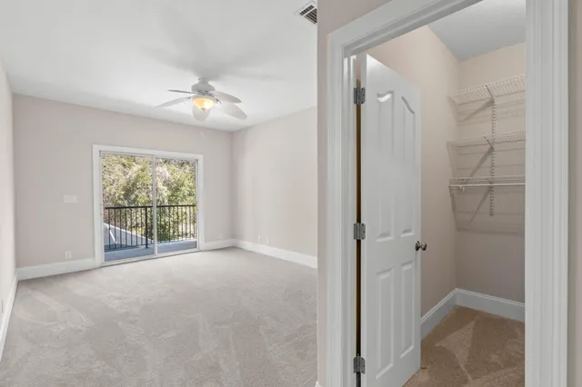 a bathroom with a sink a toilet a mirror a bathtub and shower