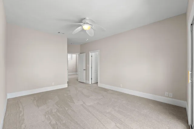 a bathroom with a tub and a window