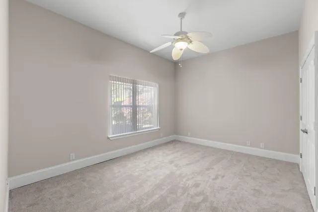 a bathroom with a sink and a window