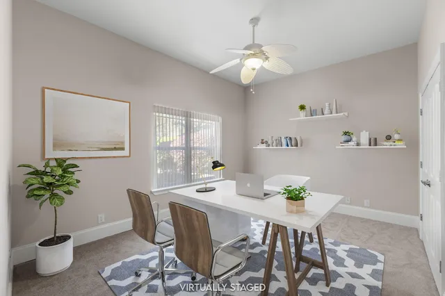 a swimming pool with outdoor seating and yard