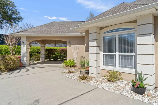 a front view of a house with a porch
