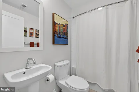 a bathroom with a sink and a toilet