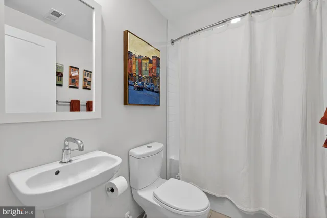 a bathroom with a sink and a toilet