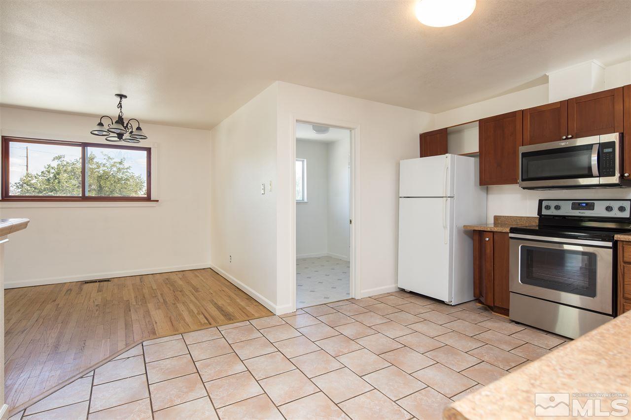3301 Bryan Street Reno, NV 89503 - Photo 5 of 25 a kitchen with a sink and steel appliances