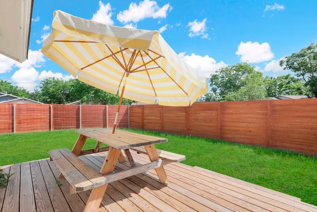 a view of yard with patio